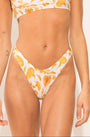 Crop bikini top from the Arabescos collection with orange and white arabesque print